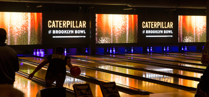screen graphics above bowling lanes
